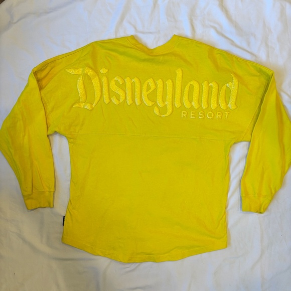 Disneyland Resort Tops - Disney Parks Spirit Jersey – Disneyland Resort Yellow Glitter Logo (Adult Med)